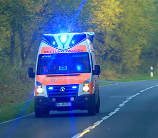 Ein Rettungswagen vom Malteser Hilfsdienst ist auf einer Landstraße bei Marienborn (Sachsen-Anhalt) unterwegs.